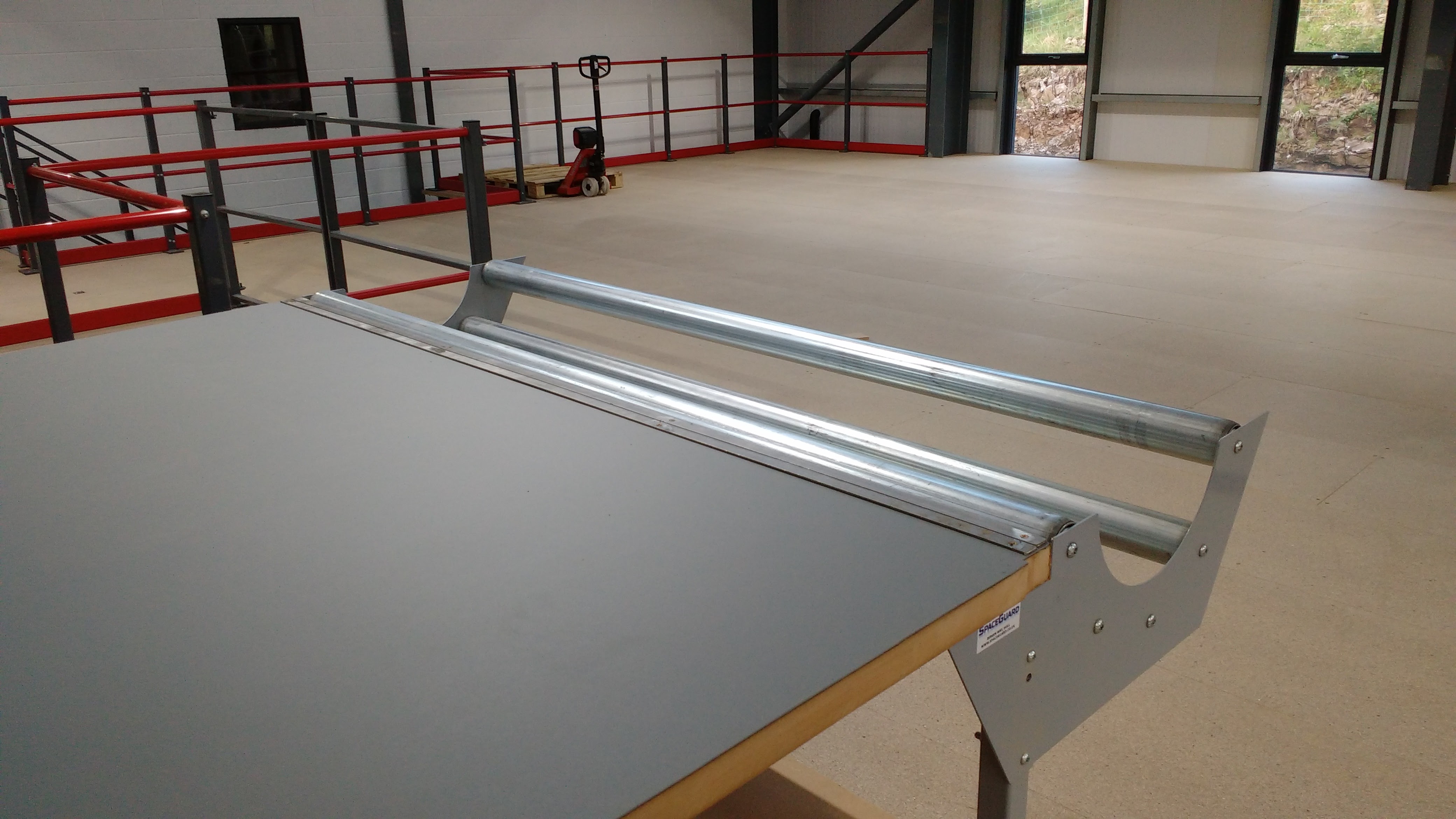 fabric cutting table with roll holder