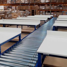 lineshaft driven roller conveyor with pack benches