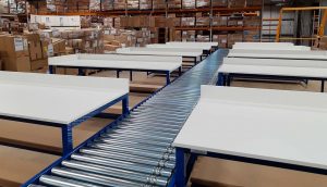 lineshaft driven roller conveyor with pack benches